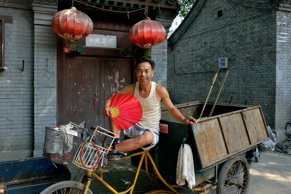 Worker taking a break in the hutongs