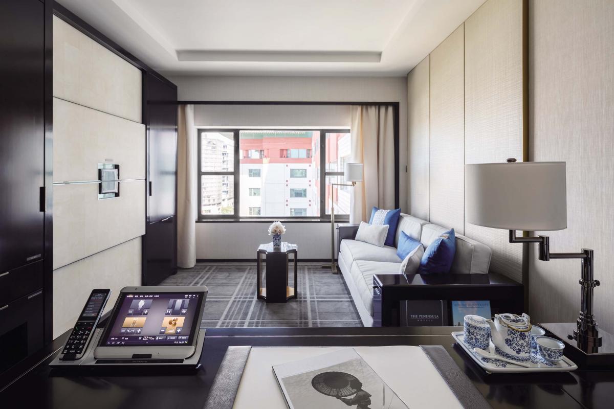The Peninsula Beijing Deluxe Room Living room and work desk
