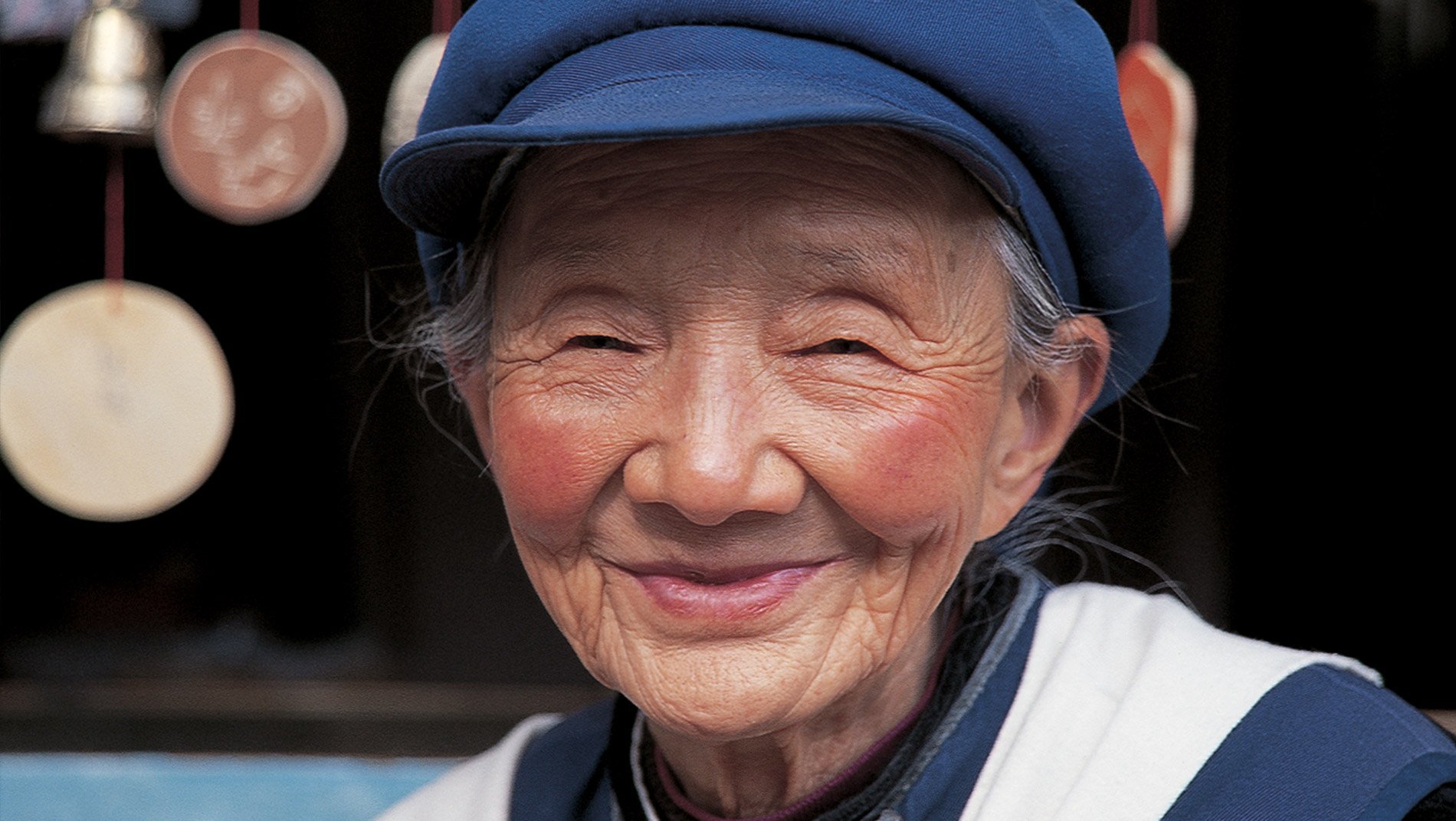 Naxi People~The Naxi are the predominant ethnic group in this border region of China. Apart from a unique writing system, language and religion, the Naxi have a distinctive dress, cuisine and musical instruments.