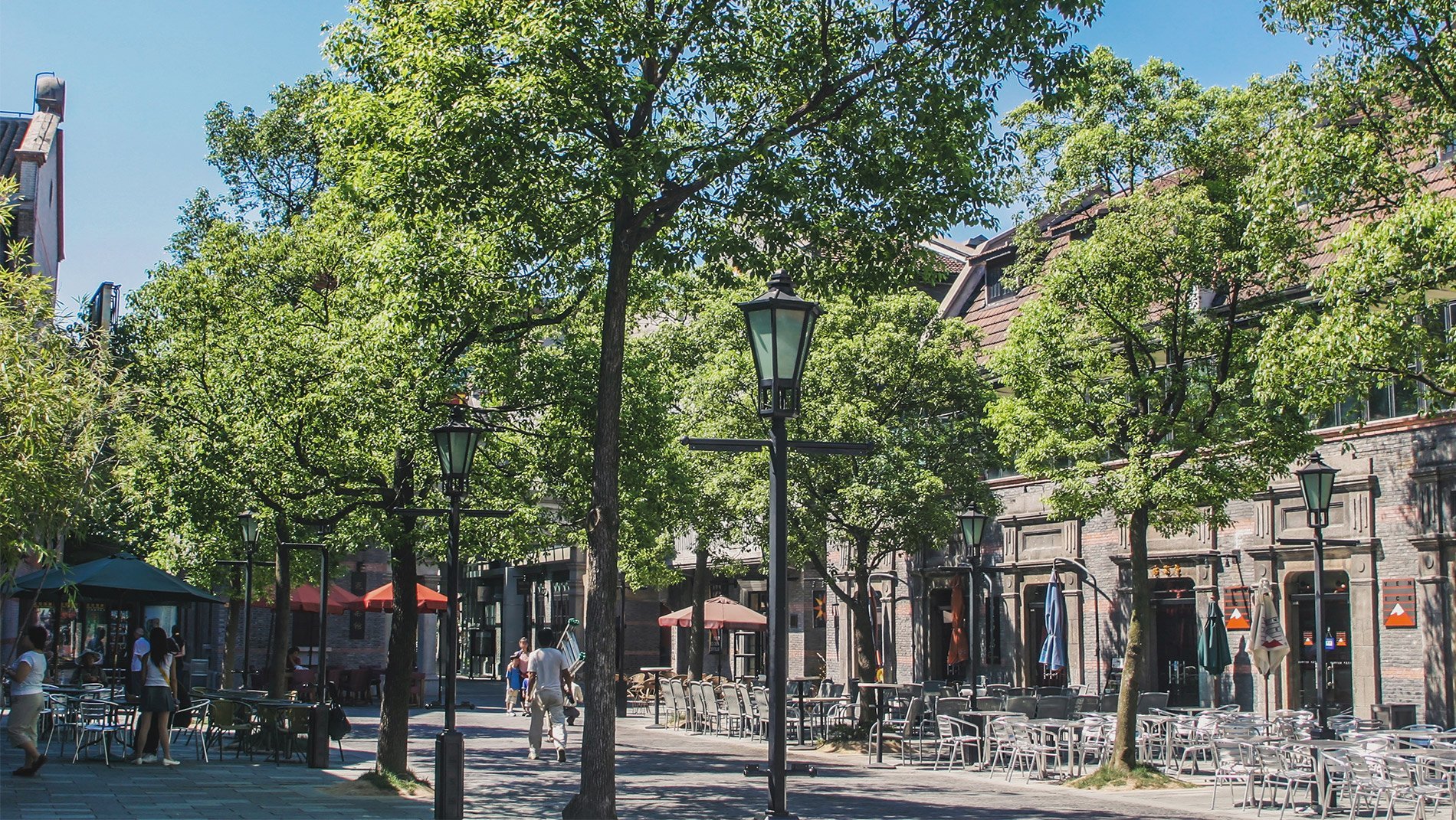 French Concession~A canopy of French poplars, planted either side of its graceful streets, creates plentiful shade under which to amble through the French concession. Its mansions and apartments incorporate Art Deco styles from all over the world.