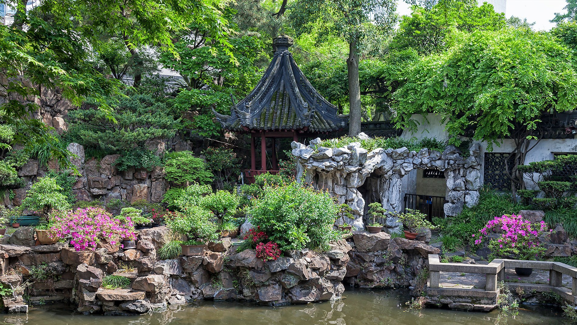 Yu Gardens~A fine example of a classical Chinese garden - pavilions, walkways and windows are incorporated within such a carefully-planned landscape that every view is a masterpiece.